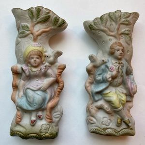 Vintage bisque ceramic Occupied Japan girl and boy tree bud vase. Total two